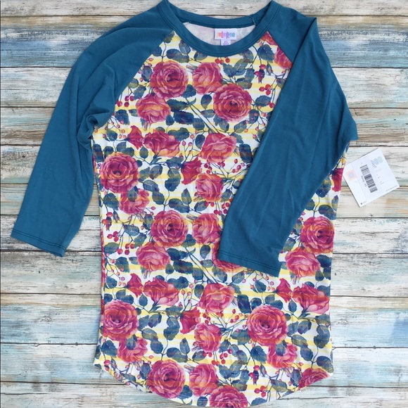 LuLaRoe Tops - Rose patterned LuLaRoe Randy size XSmall